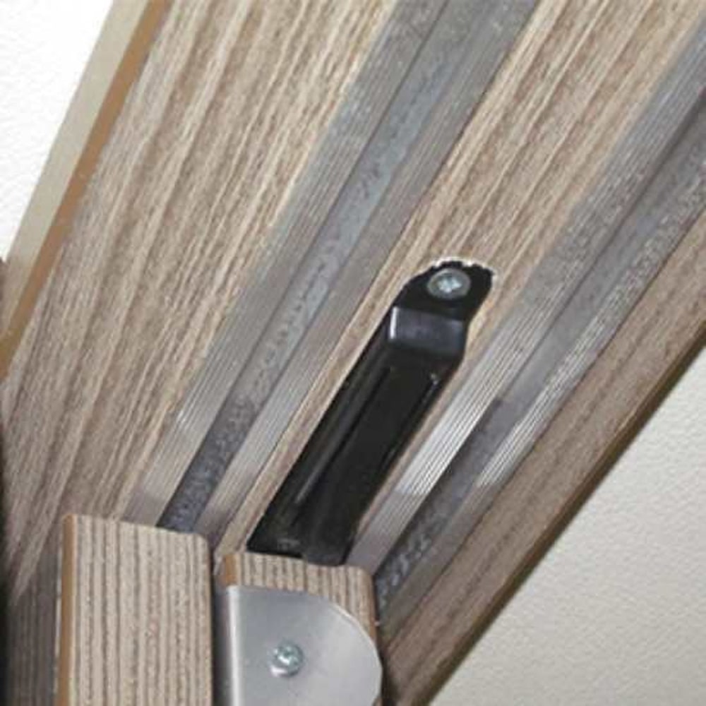 Arrt de porte de placard coulissant