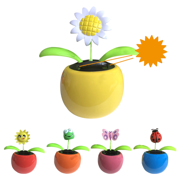 Figurine solaire en pot pour tableau de bord 