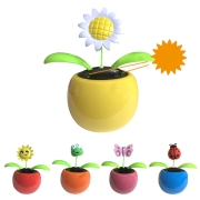 Figurine solaire en pot pour tableau de bord